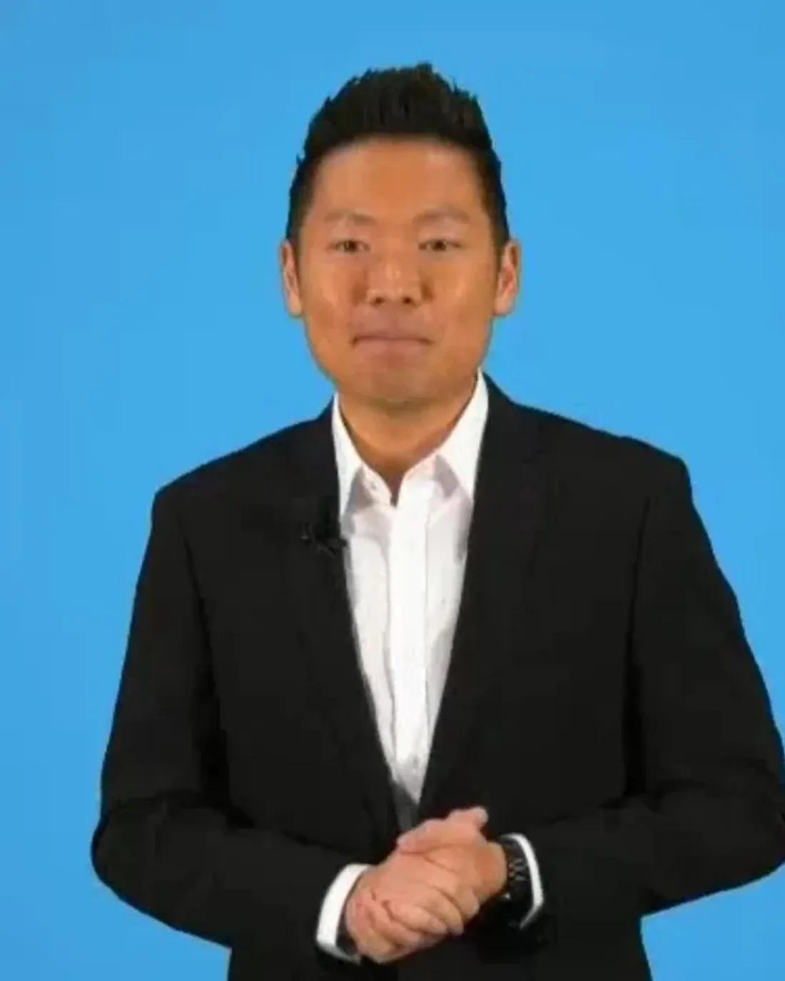 James Yang presenting in a green screen studio for a livestreamed virtual event in Singapore